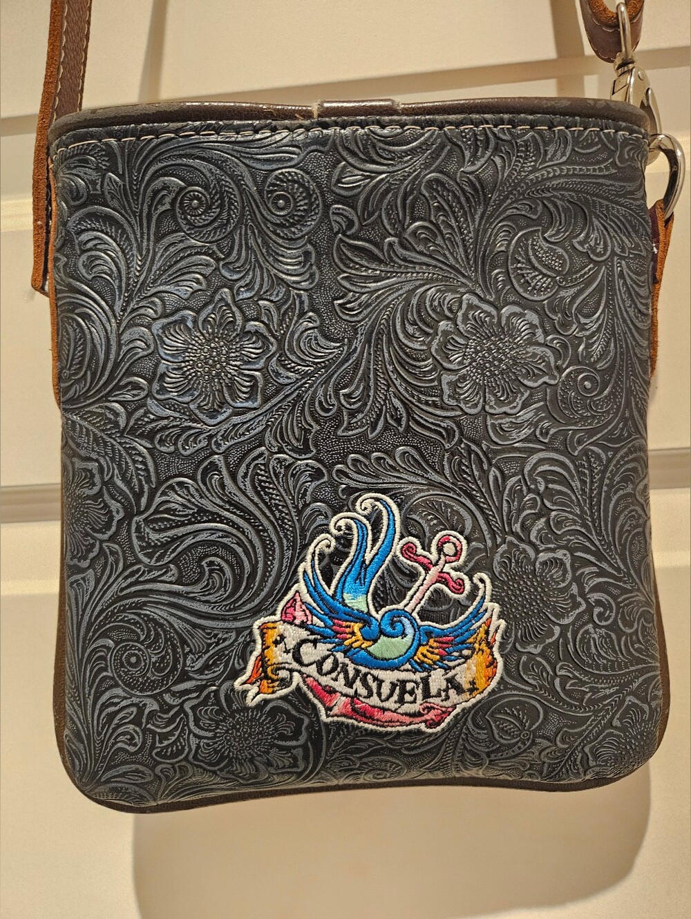 Consuela Black Embossed Leather Crossbody Bag with Colorful Patch